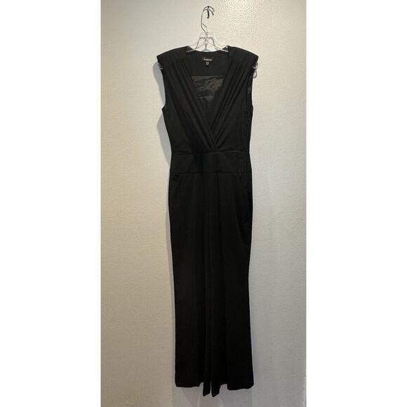 BEBE Women’s Size 10 Sleeveless Black Jumpsuit Pockets Deep V-Neck Classic Glam - Picture 1 of 8